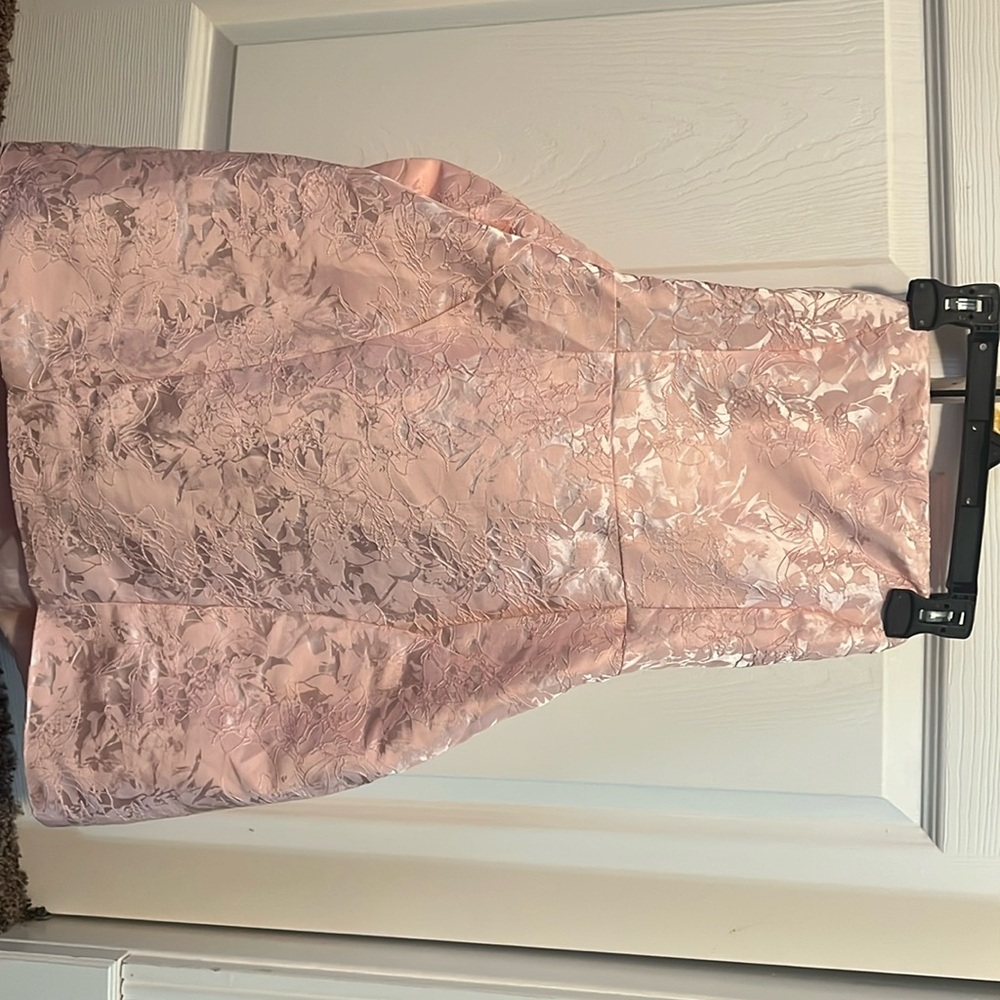 Bought it off a pretty little thing.Pink floral patterns,mini, size m w bow.